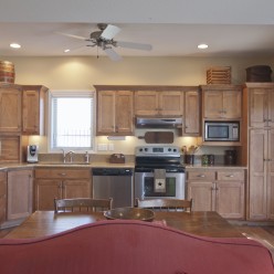 Open kitchen with access to screened-in porch