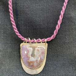 Necklace features Burro Creek Agate mounted on Sterling silver. Crafted and contributed by Judy Willingham.