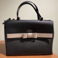 Raffle Prize: Kate Spade bag with surprise goodies inside