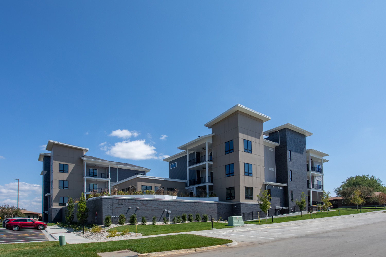 Exterior view of Meadowlark's IL apartment building, The Monarch.