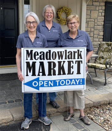 Residents Jo Fey, Vicky Auman, and Karen Matthews at Meadowlark Market