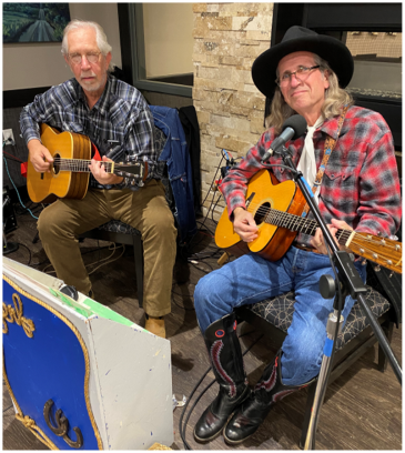 Neal Marten  and Dave  Zerfas  play and  sing for the  guests’  supper.