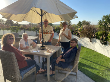 Party attendees enjoying the Clubhouse Patio.