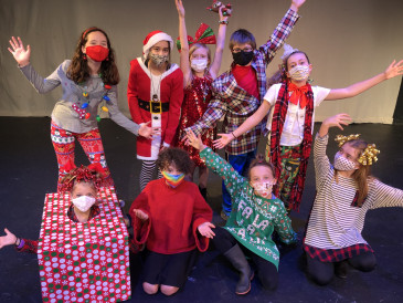 Students from the Manhattan Arts Center’s Youth Theater Program perform the classic poem “A Visit from St. Nicholas” by Clement Clarke Moore. 