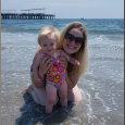 Sarah and Murphy swimming in the ocean at Coney Island Beach.