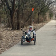 Steve Bietau rides his three-wheel recumbent trike on Manhattan’s Linear Trail. 