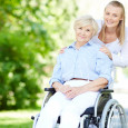 A young woman and an older woman in a wheelchair